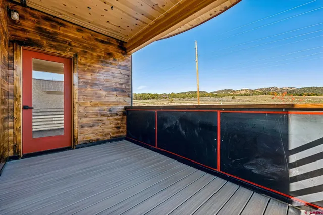 a view of outdoor space and wooden deck