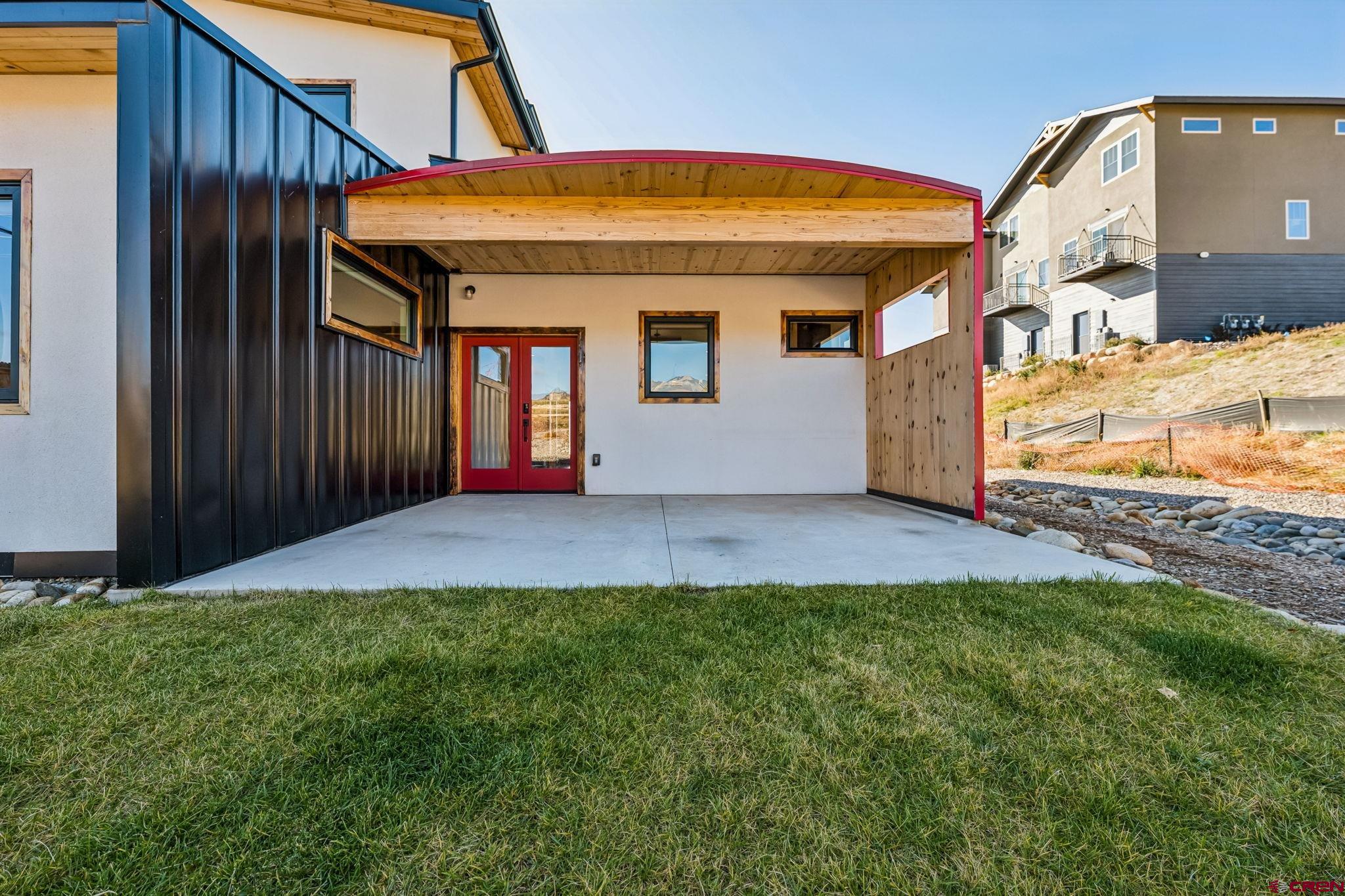 227 Sage View Street Durango, CO 81301 - Photo 31 of 35 a view of a house with a yard