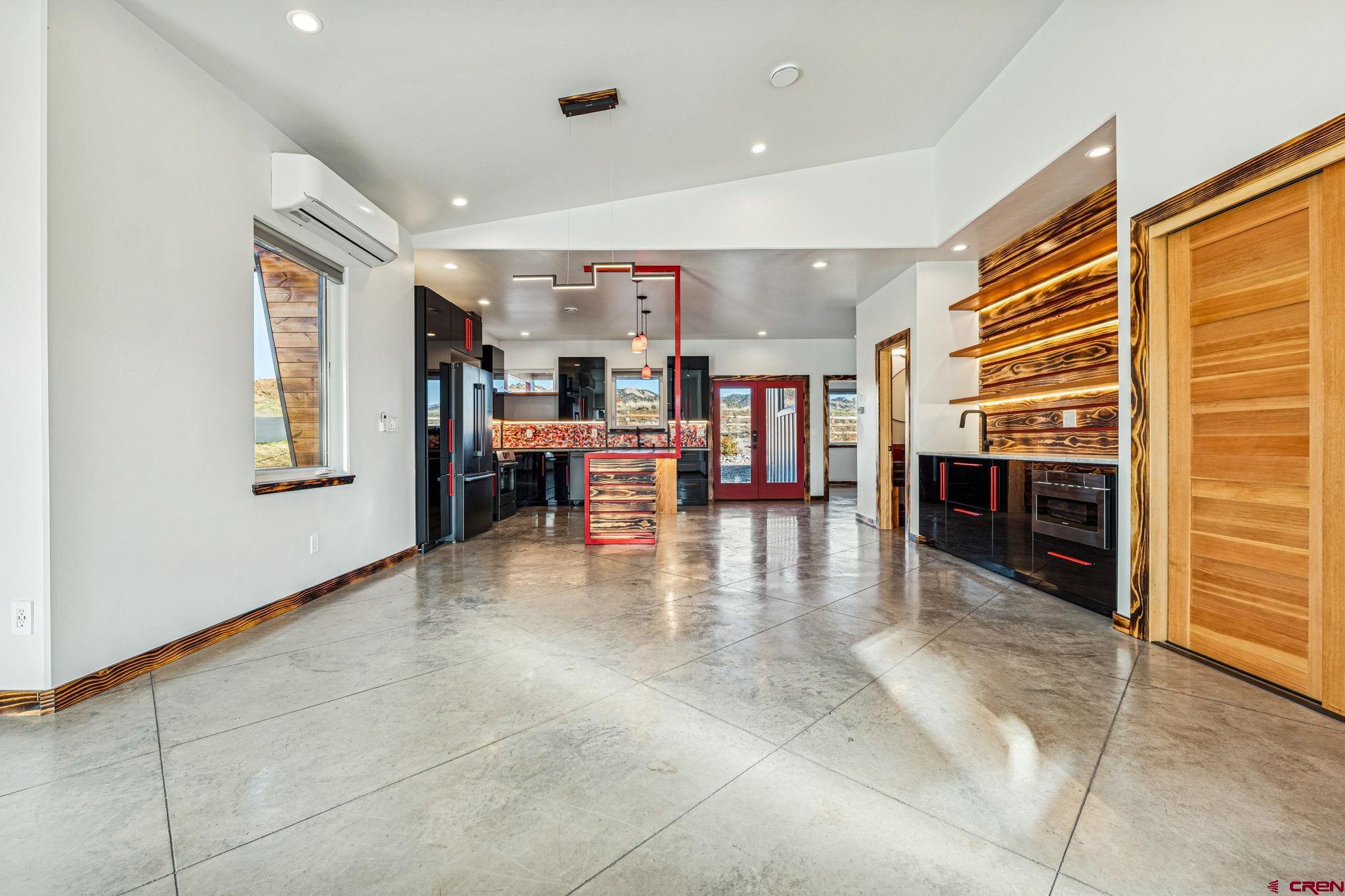 227 Sage View Street Durango, CO 81301 - Photo 4 of 35 a view of a livingroom with furniture and kitchen view