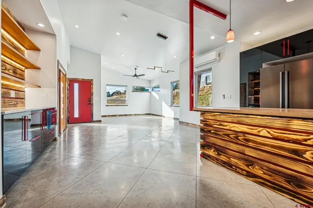 a view of an entryway with kitchen