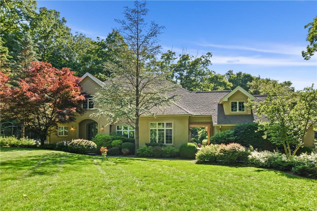 45 Autumn Ridge Road Pound Ridge, NY 10576 - Photo 1 of 1 a front view of a house with a yard