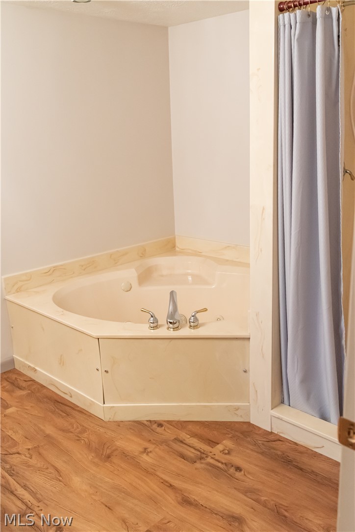 2319 Burbank Road Wooster, OH 44691 - Photo 27 of 31 Lower level full bathroom with shower and soaking tub.