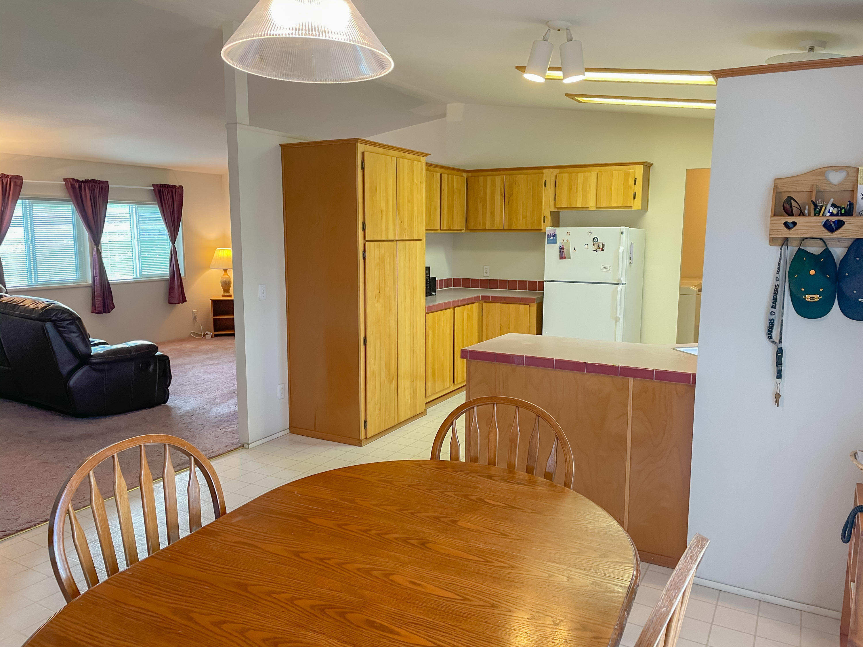 11806 Postma Road Moxee, WA 98936 - Photo 6 of 24 a bedroom with a bed and wooden floor