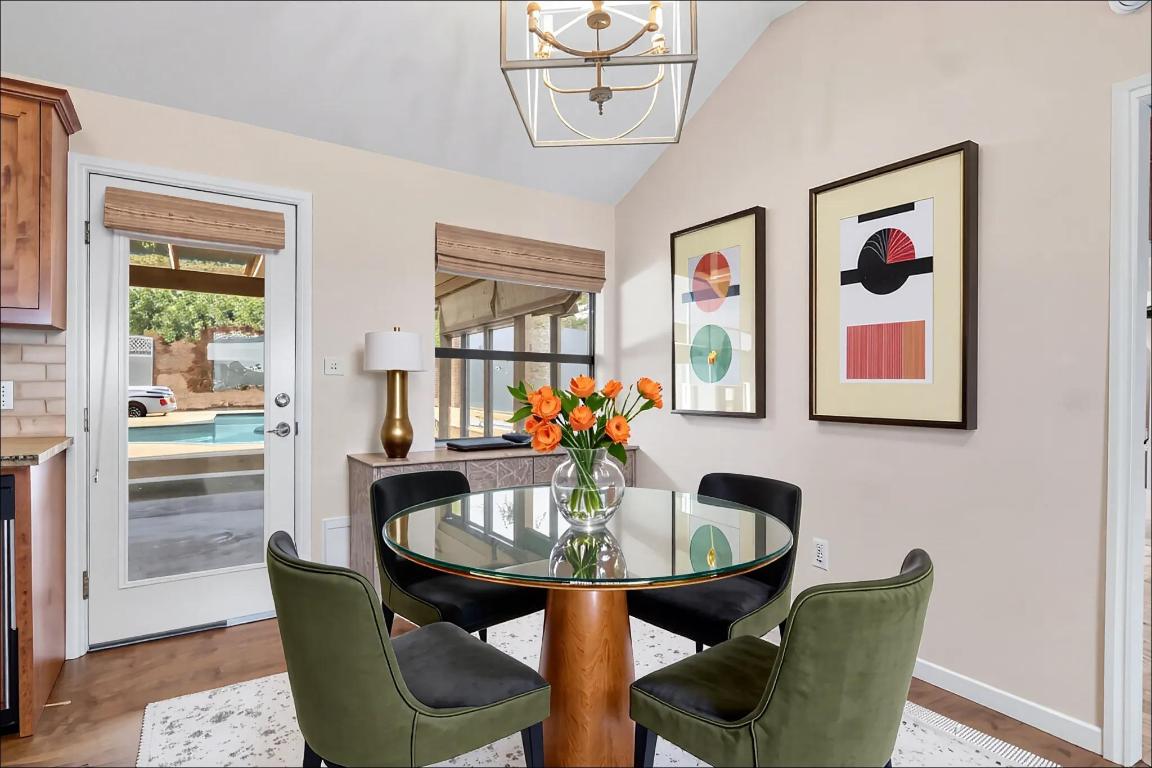 10213 Thomas Lane Dripping Springs, TX 78620 - Photo 13 of 40 a dining room with furniture and window
