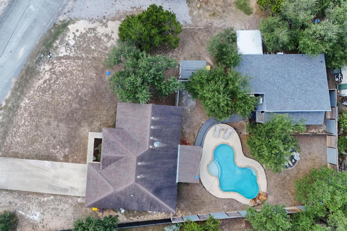10213 Thomas Lane Dripping Springs, TX 78620 - Photo 30 of 40 an aerial view of a house with a yard and lake view