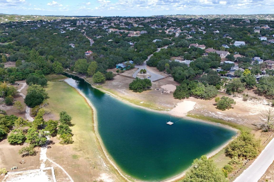 10213 Thomas Lane Dripping Springs, TX 78620 - Photo 33 of 40 an aerial view of residential houses with outdoor space