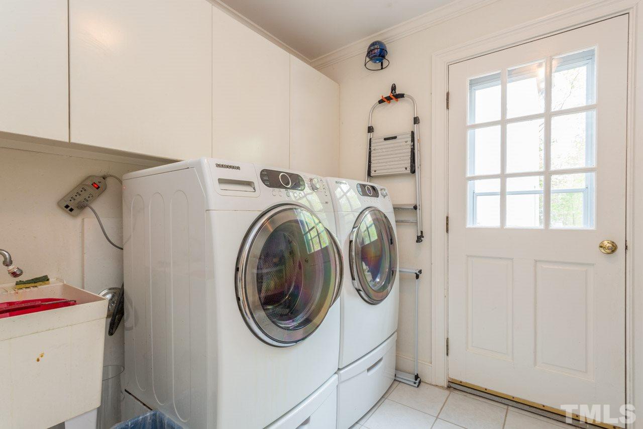 905 Brookfield Road Raleigh, NC 27615 - Photo 15 of 25 a utility room with dryer and washer