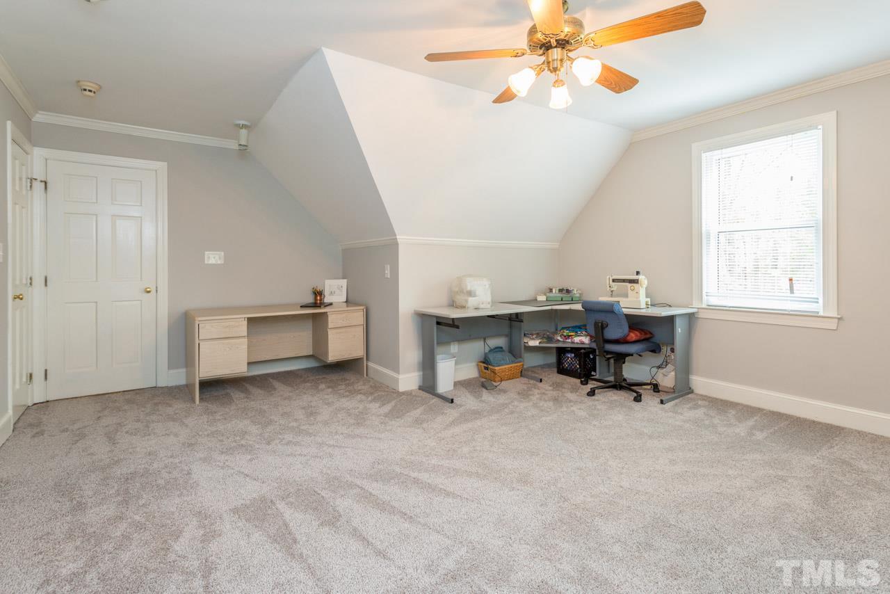 905 Brookfield Road Raleigh, NC 27615 - Photo 20 of 25 a view of livingroom with workspace and a window