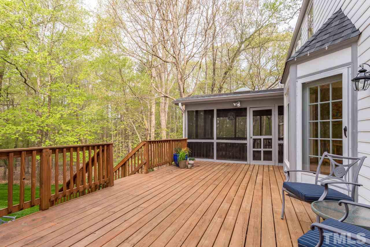 905 Brookfield Road Raleigh, NC 27615 - Photo 23 of 25 a view of a house with large window and wooden floor