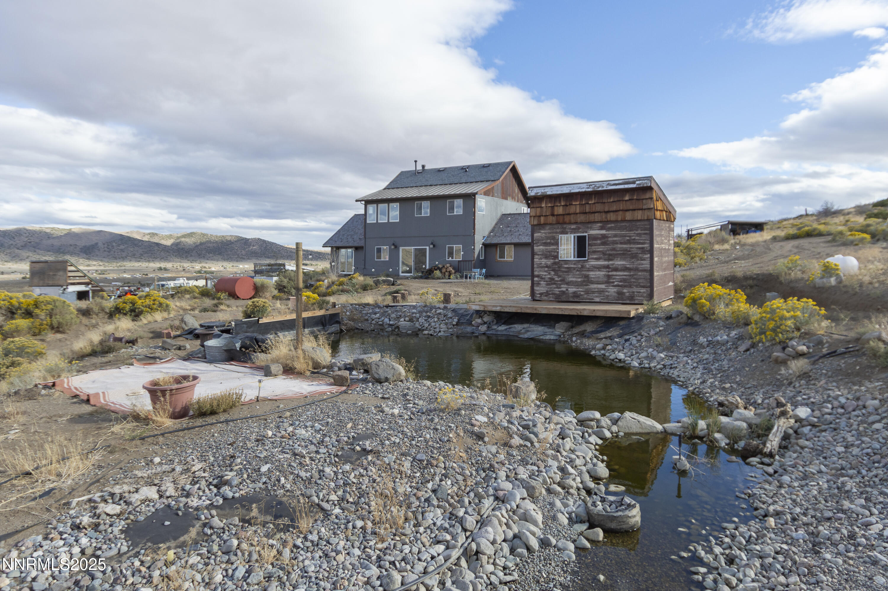 20 Prairie Way Reno, NV 89506 - Photo 2 of 48 a view of roof with two chairs in front of house