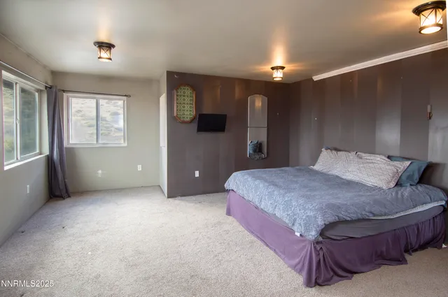 a bathroom with a shower and a sink