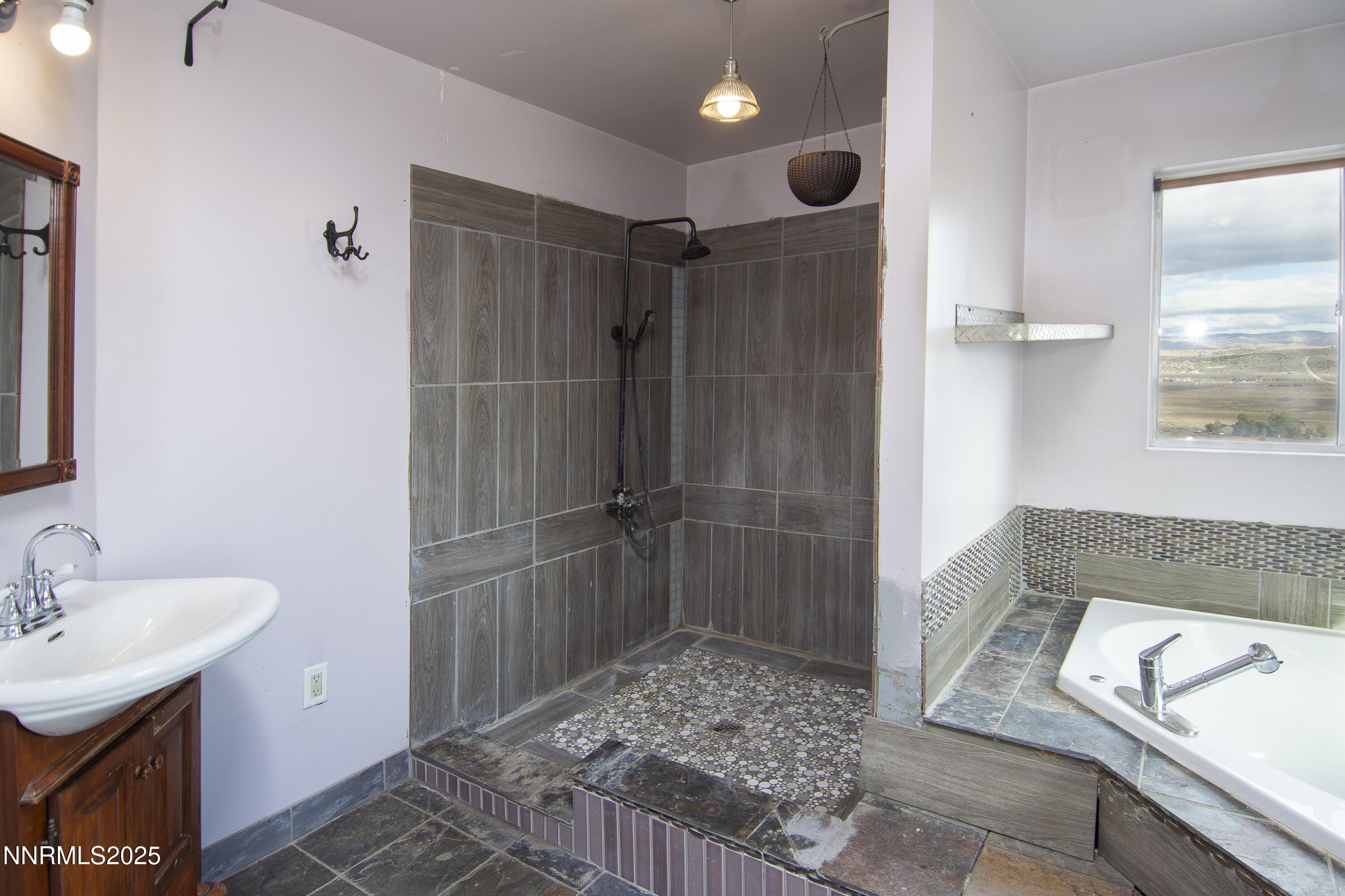 20 Prairie Way Reno, NV 89506 - Photo 37 of 48 a bathroom with a shower and a sink