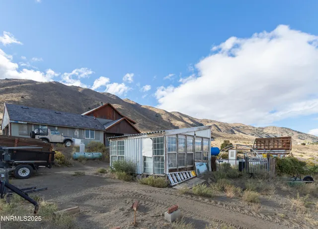 a view of a house with a patio