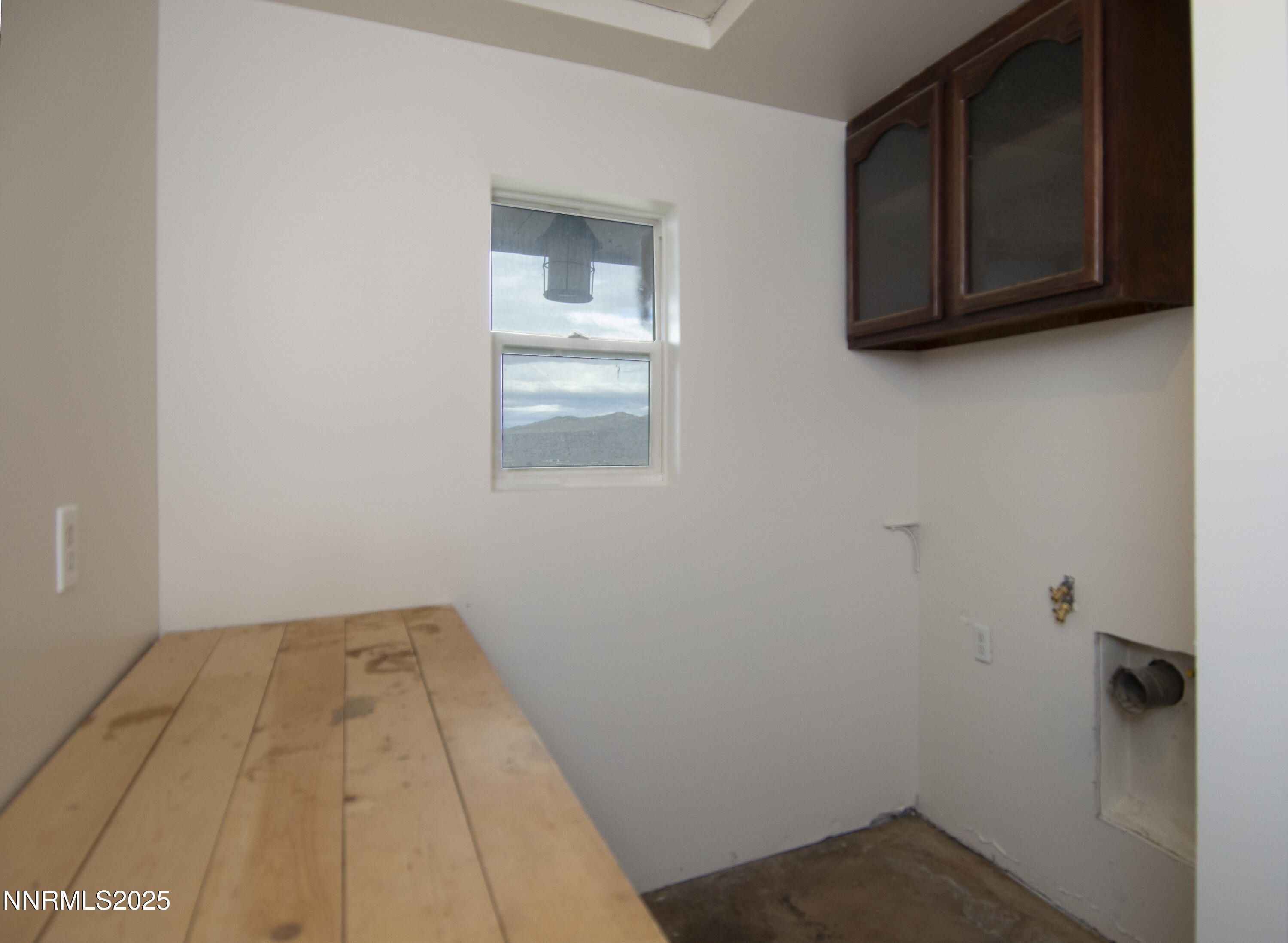 20 Prairie Way Reno, NV 89506 - Photo 42 of 48 a view of a room with wooden floor and cabinet