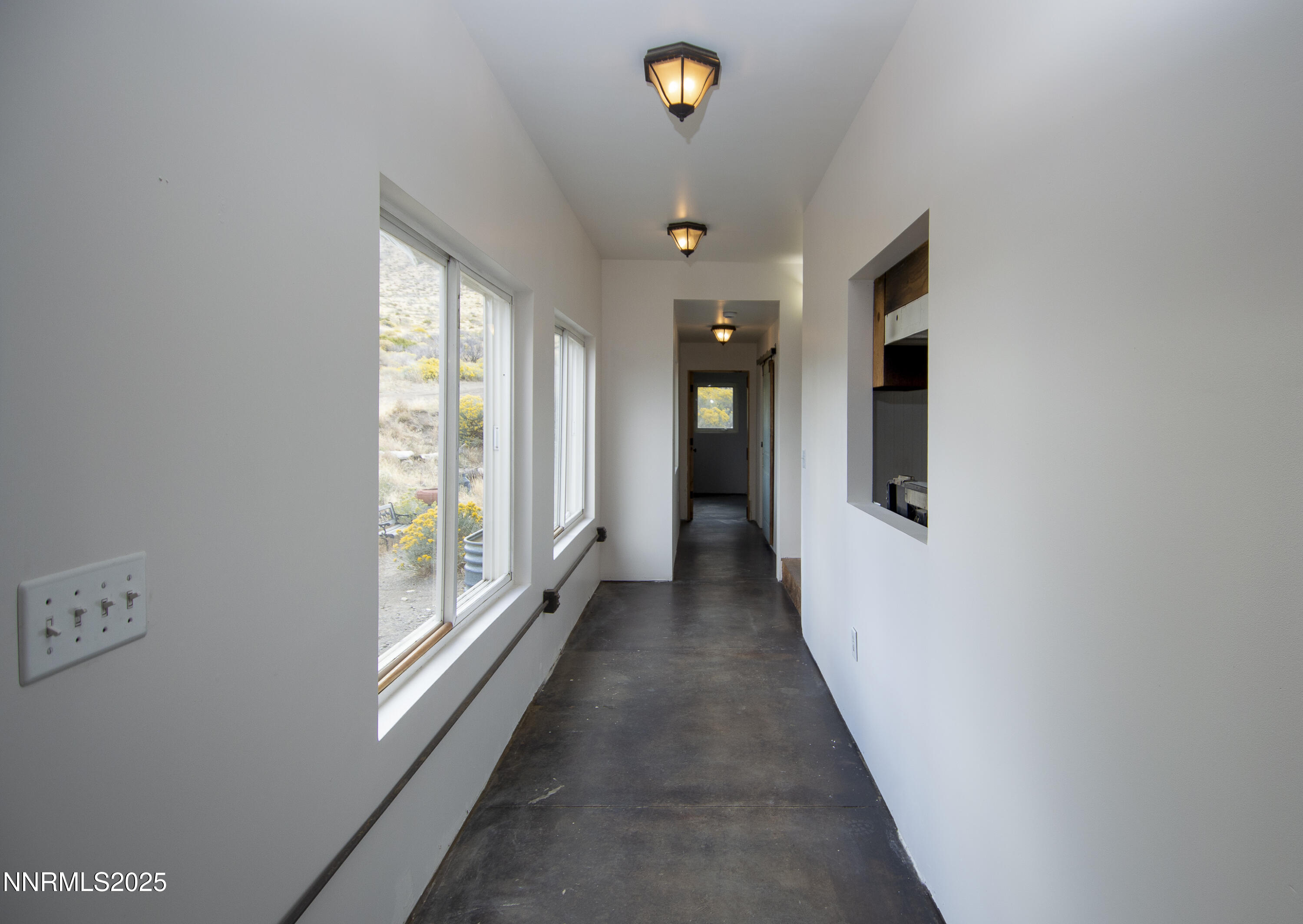 20 Prairie Way Reno, NV 89506 - Photo 44 of 48 a view of a hallway with windows