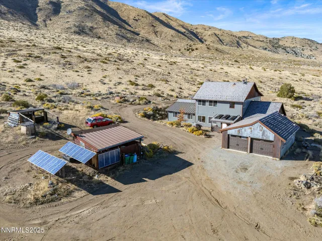 a view of roof deck with a barbeque and wooden stairs