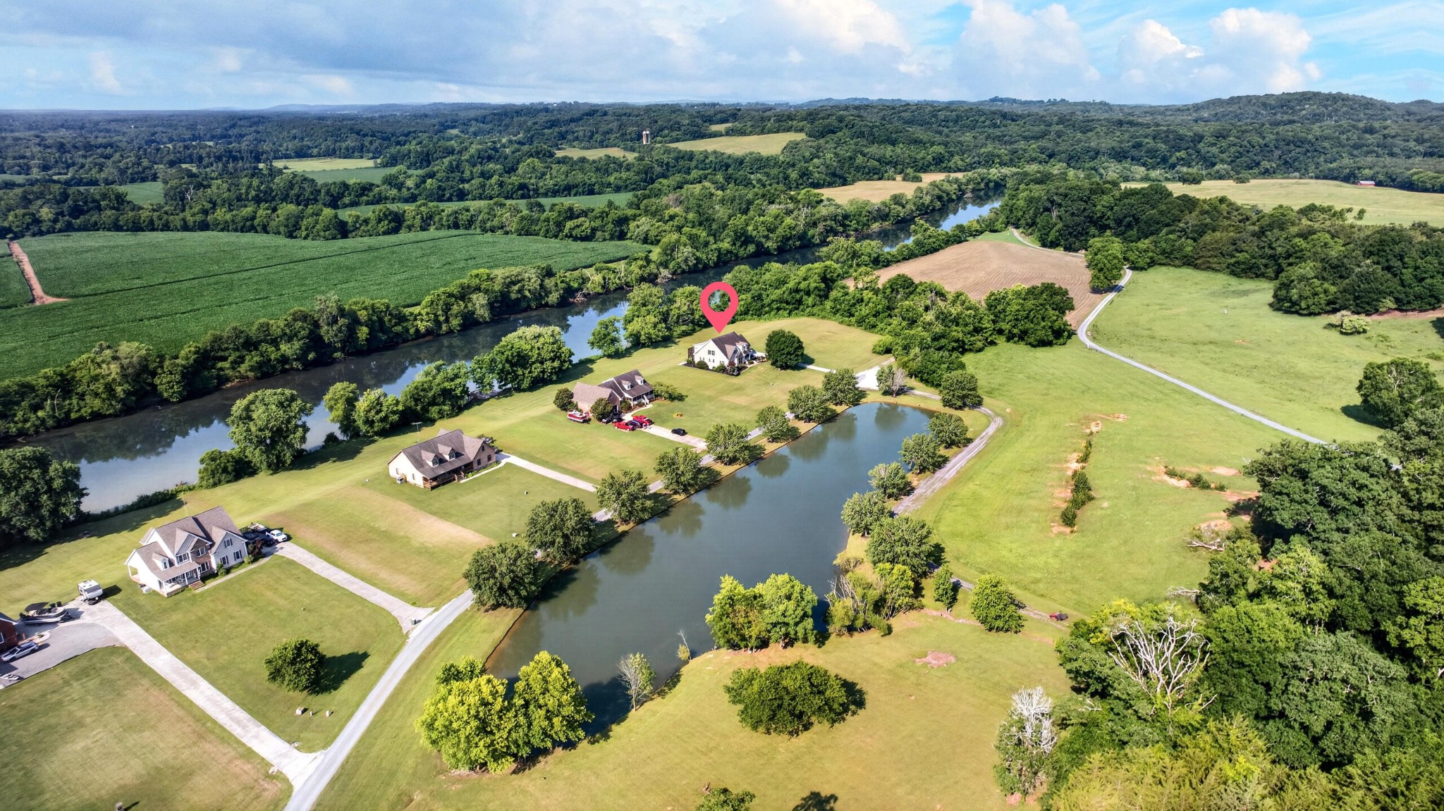 759 Pinhook Road Calhoun, TN 37309 - Photo 59 of 70 an aerial view of residential houses with outdoor space