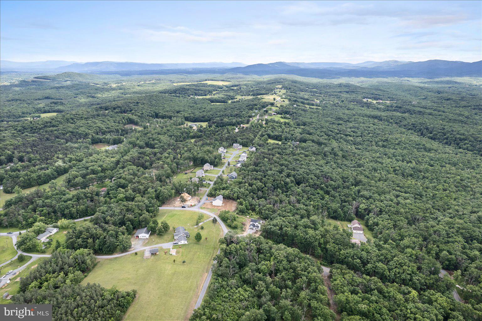 11-12 Glen Ridge Road Winchester, VA 22602 - Photo 6 of 11 an aerial view of a houses with a yard and mountain