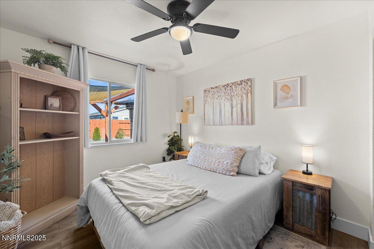 17675 Alexandria Court Reno, NV 89508 - Photo 11 of 31 a bedroom with a bed and a window