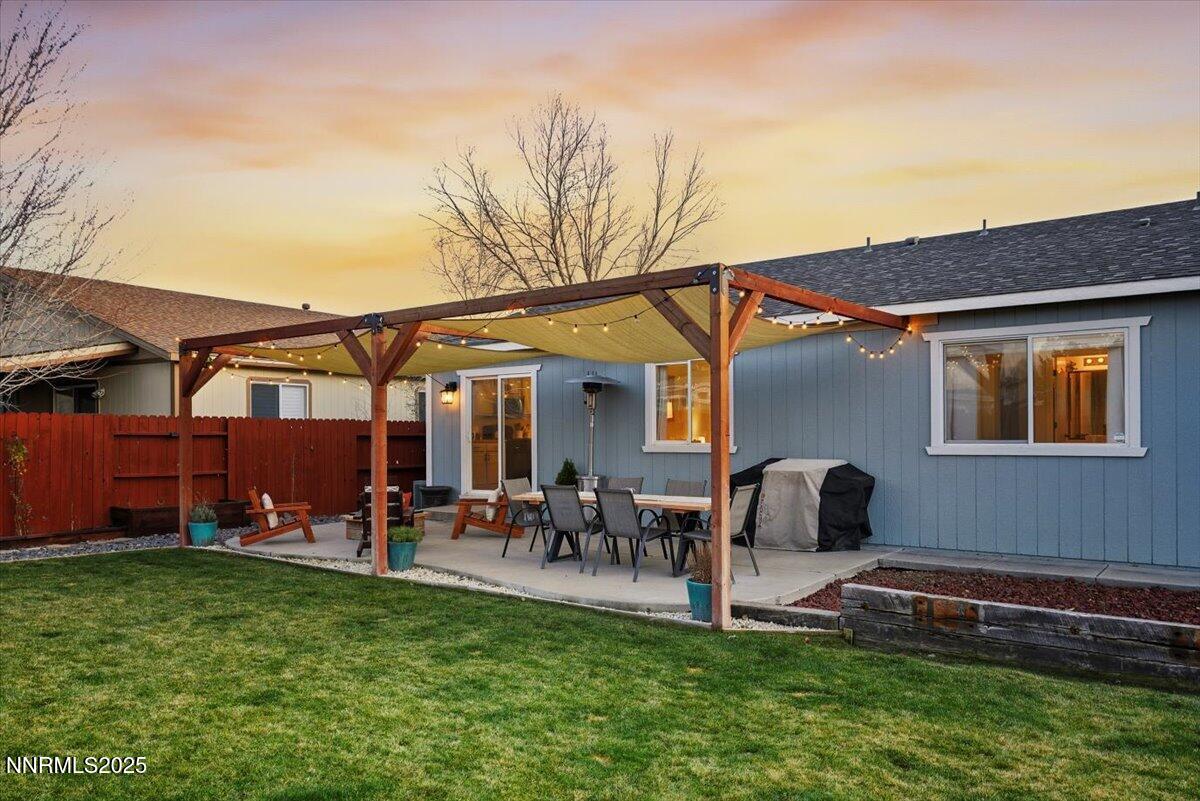 17675 Alexandria Court Reno, NV 89508 - Photo 23 of 31 a view of a patio with chair and tables