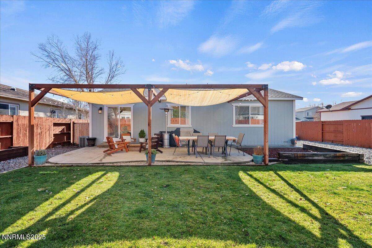 17675 Alexandria Court Reno, NV 89508 - Photo 29 of 31 a view of a house with backyard and sitting area