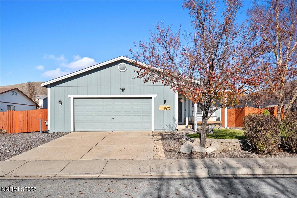 17675 Alexandria Court Reno, NV 89508 - Photo 31 of 31 a front view of a house with a yard and garage