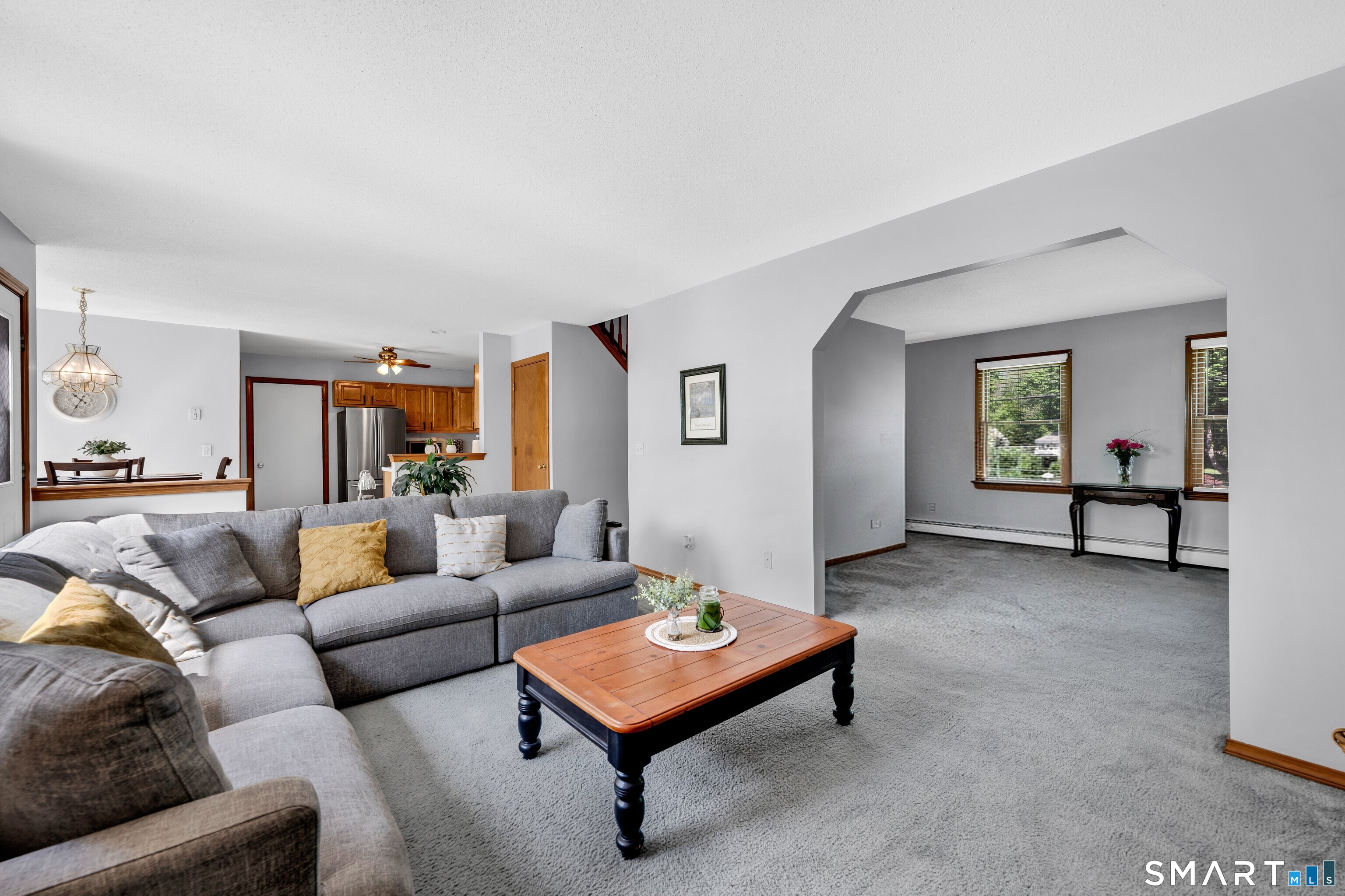 89 Windsorville Road South Windsor, CT 06074 - Photo 7 of 23 a living room with furniture and a rug
