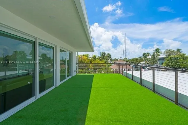 a view of a garden from a balcony