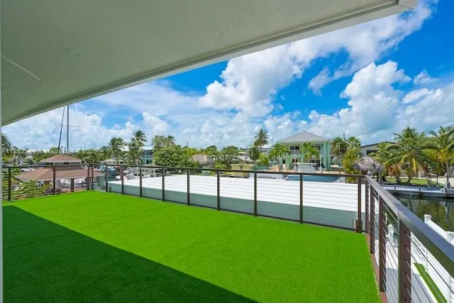 a view of a garden from a balcony