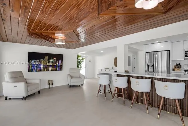 a large living room with furniture