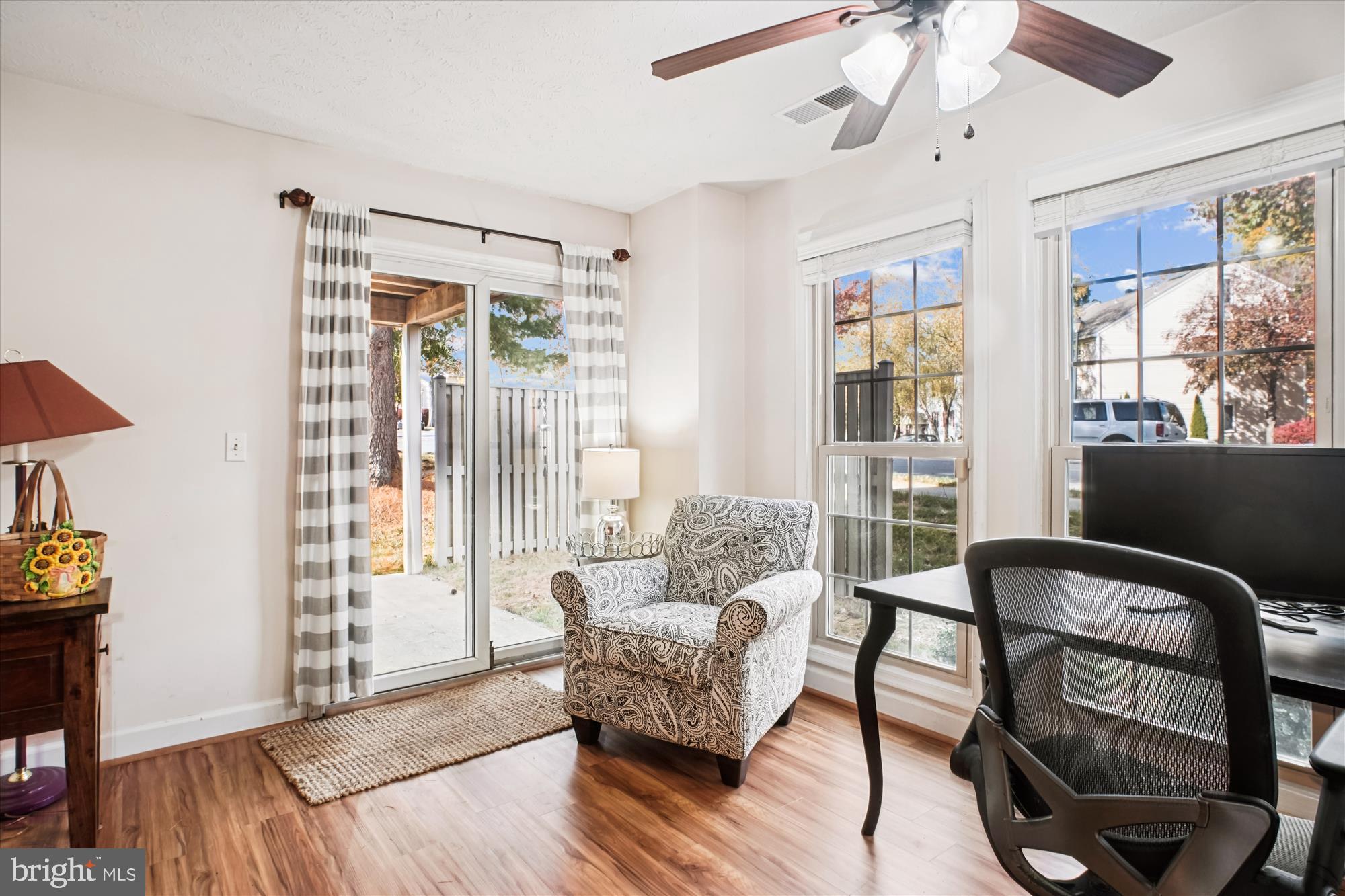 3801 Ridge Knoll Court, Unit 2A Fairfax, VA 22033 - Photo 13 of 37 a living room with furniture and a window