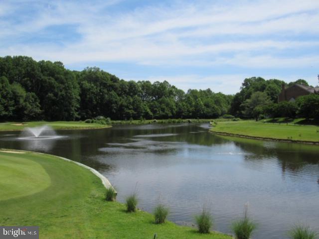 3801 Ridge Knoll Court, Unit 2A Fairfax, VA 22033 - Photo 30 of 37 a view of a lake with a house in the background