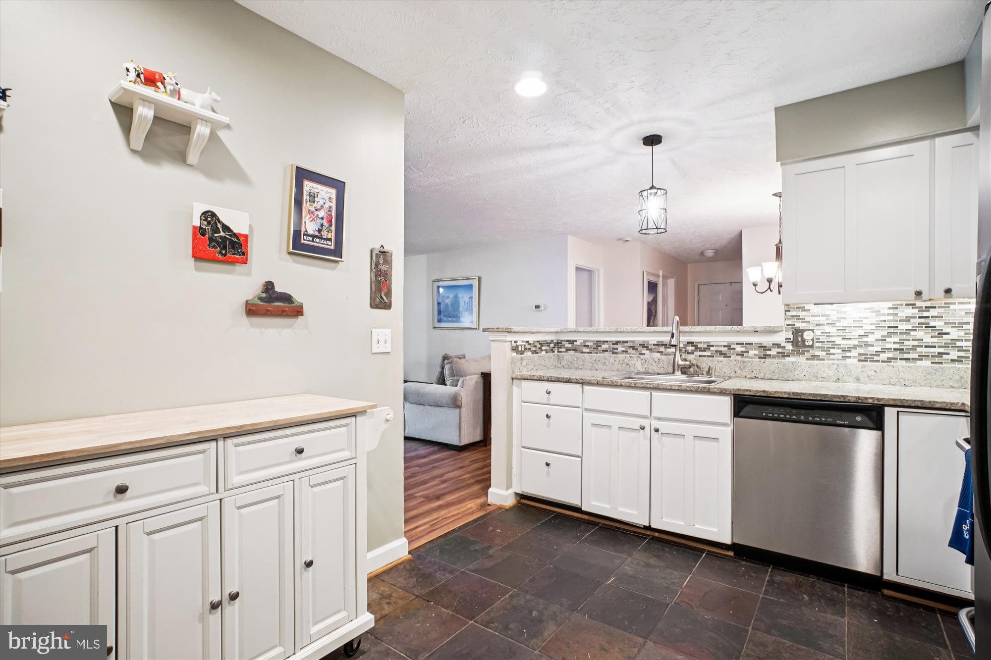 3801 Ridge Knoll Court, Unit 2A Fairfax, VA 22033 - Photo 6 of 37 a spacious bathroom with a granite countertop sink a mirror and a