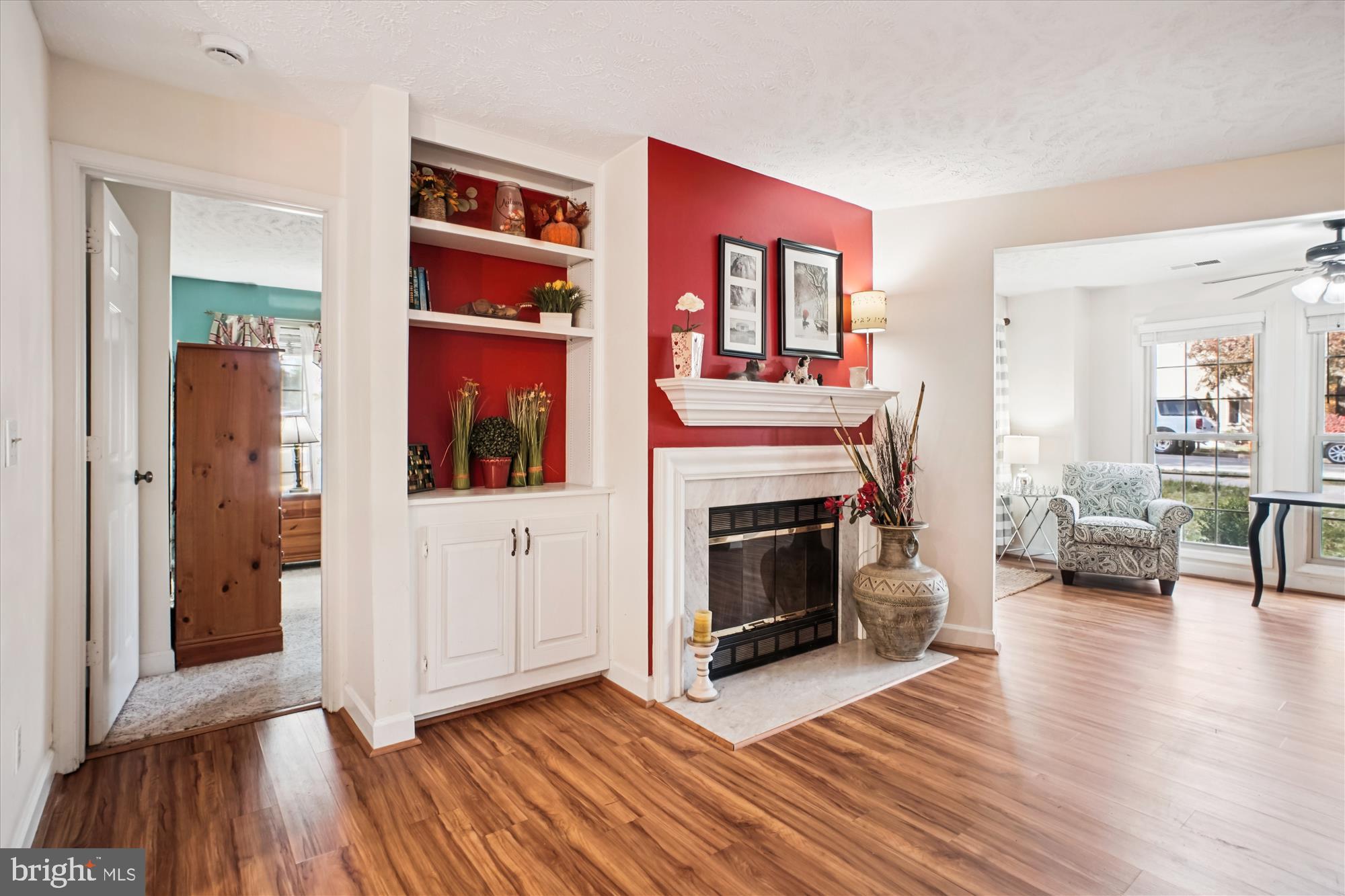 3801 Ridge Knoll Court, Unit 2A Fairfax, VA 22033 - Photo 8 of 37 a living room with furniture and a fireplace