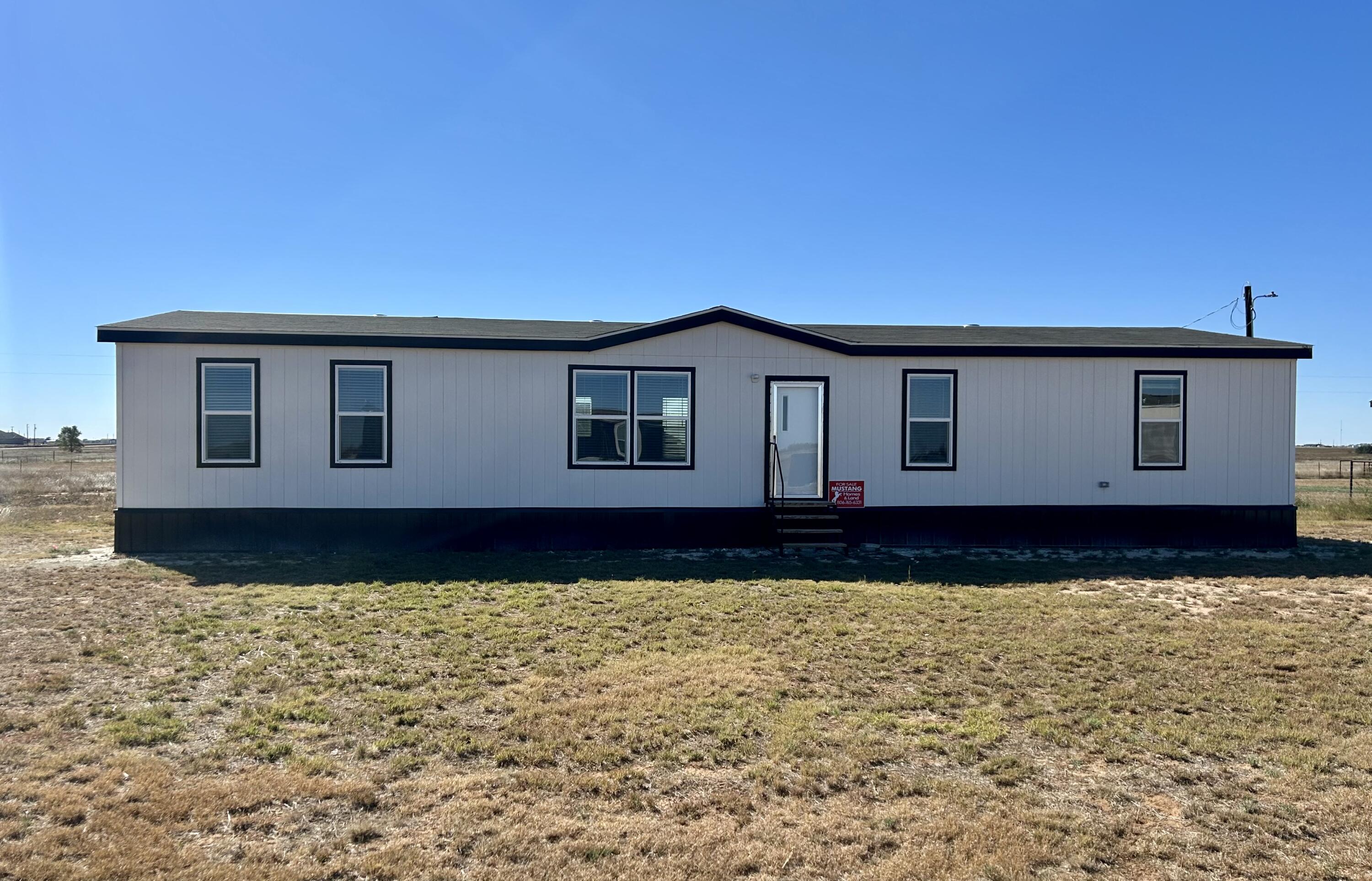 a house view with a garden space