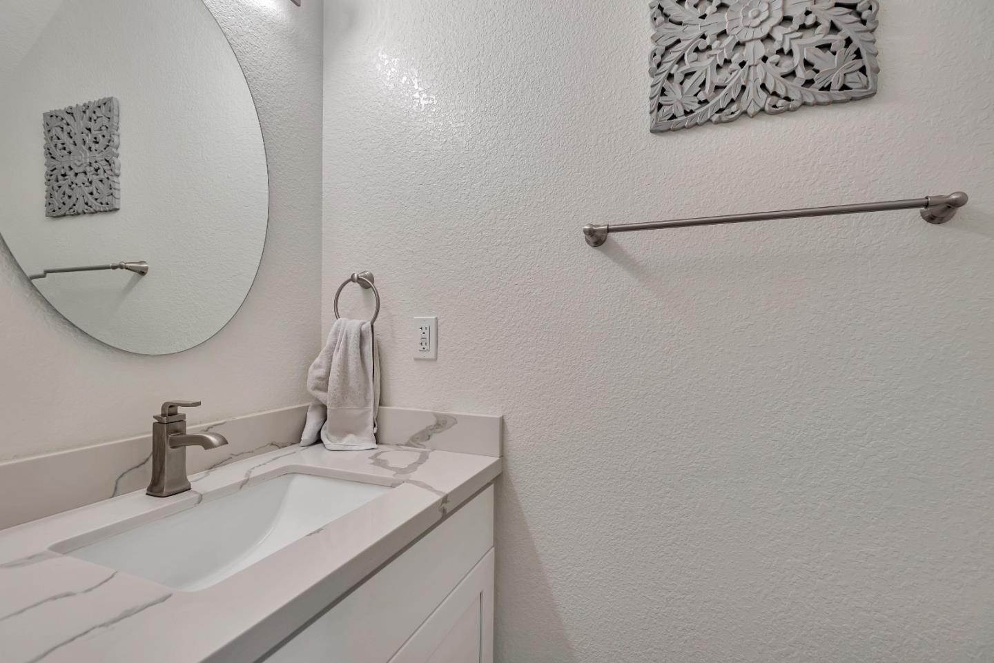 1377 Lerida Way Pacifica, CA 94044 - Photo 11 of 25 a bathroom with a sink and a mirror