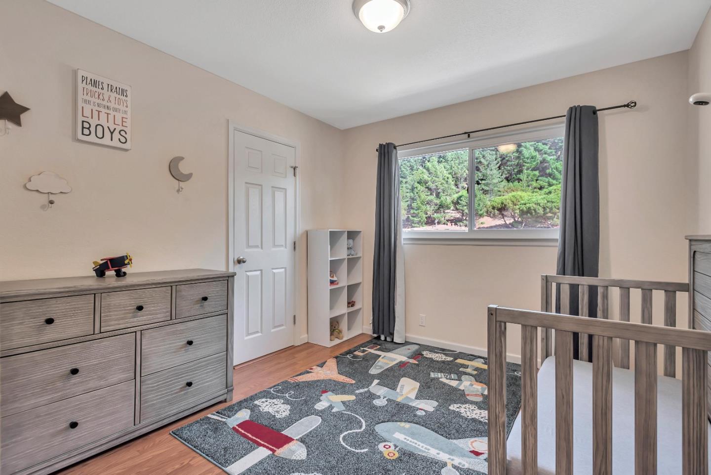 1377 Lerida Way Pacifica, CA 94044 - Photo 15 of 25 a bedroom with furniture and a window