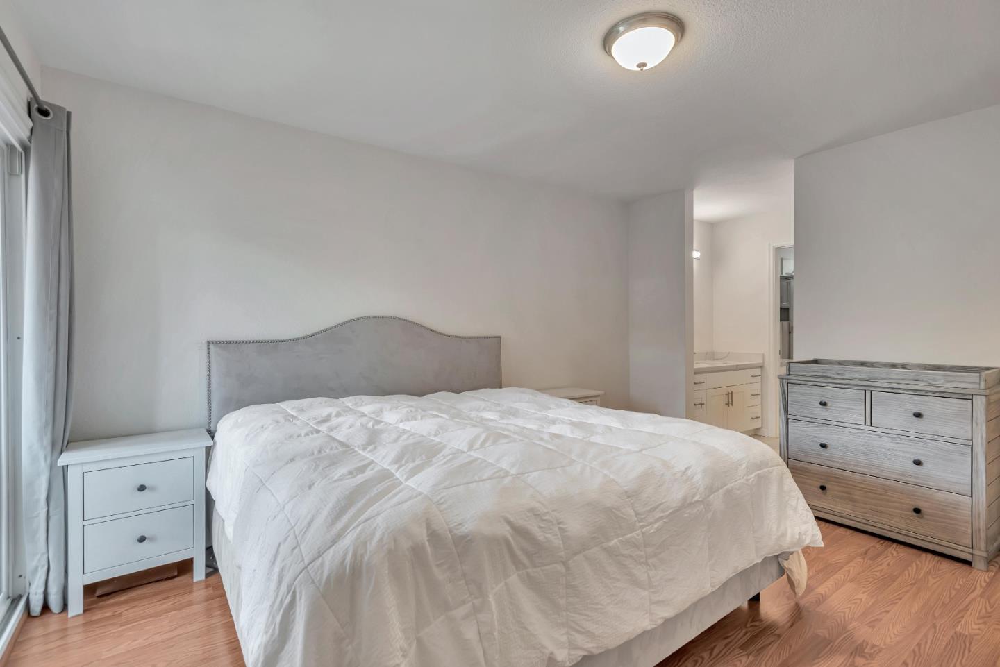 1377 Lerida Way Pacifica, CA 94044 - Photo 18 of 25 a large white bed in a white room