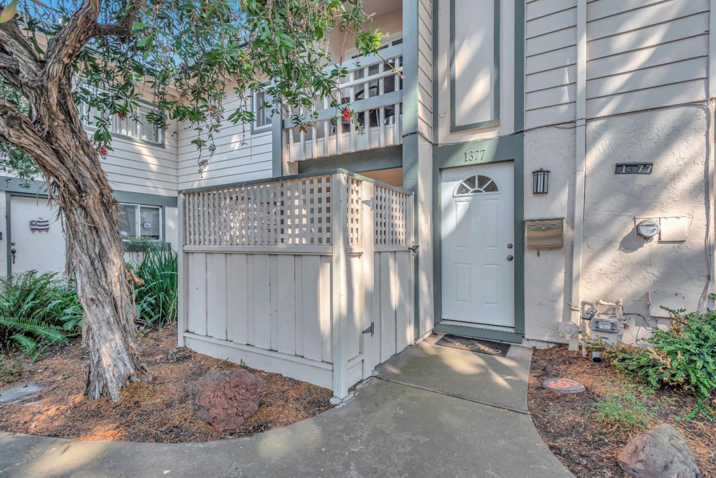 1377 Lerida Way Pacifica, CA 94044 - Photo 2 of 25 a view of a street with a tree