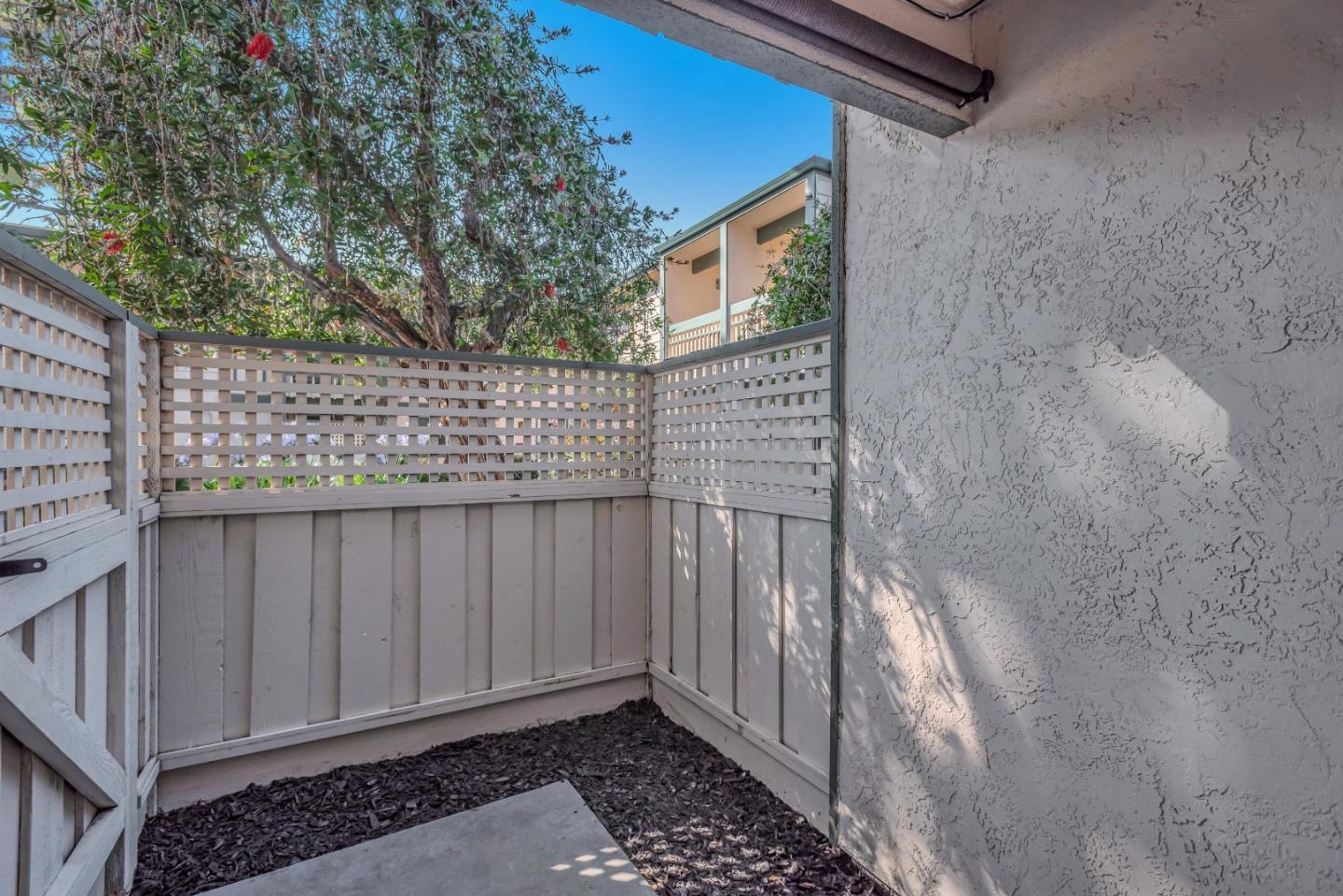 1377 Lerida Way Pacifica, CA 94044 - Photo 7 of 25 a view of a wooden fence