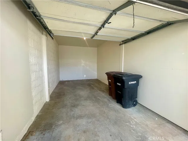 a room that has a bed and a table