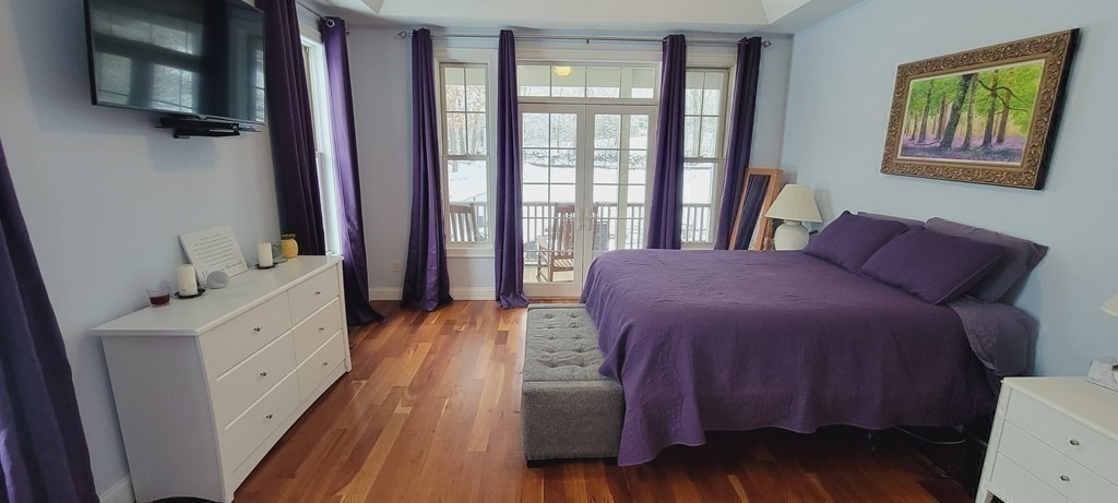 358 Rutherford Road Oakham, MA 01068 - Photo 17 of 42 a spacious bedroom with a bed and a dresser