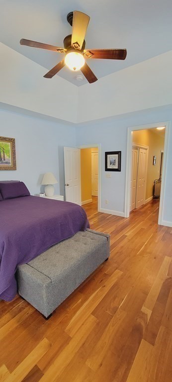 358 Rutherford Road Oakham, MA 01068 - Photo 18 of 42 a bedroom with a bed and a ceiling fan