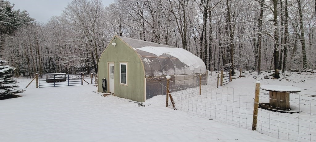 358 Rutherford Road Oakham, MA 01068 - Photo 30 of 42 a view of a terrace with chairs and a table and chairs