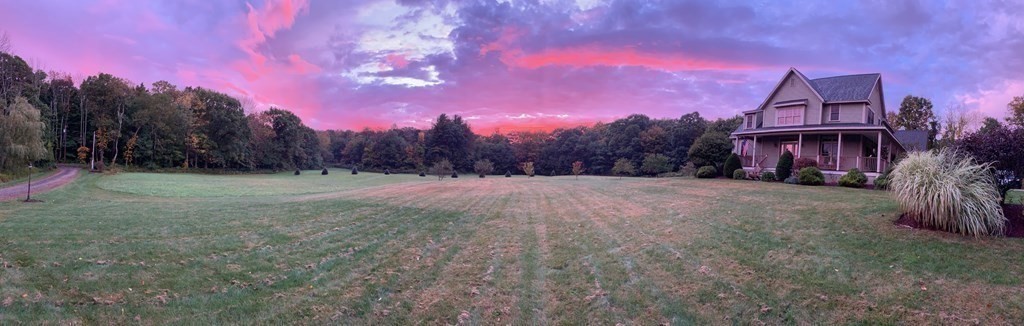 358 Rutherford Road Oakham, MA 01068 - Photo 3 of 42 a view of a backyard with a house