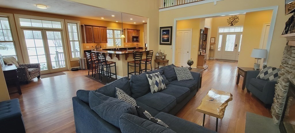 358 Rutherford Road Oakham, MA 01068 - Photo 10 of 42 a living room with furniture and wooden floor