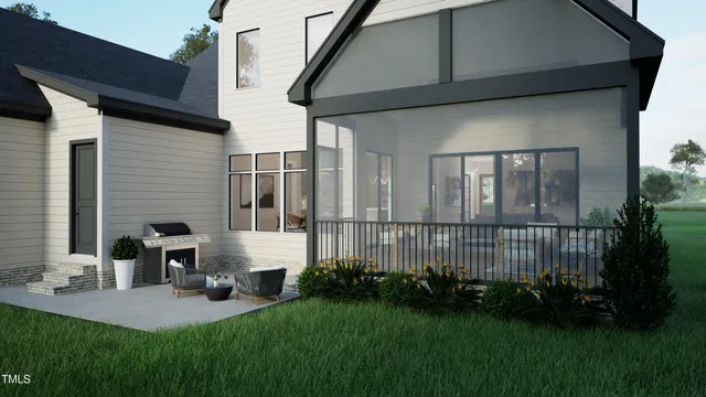 a view of backyard of house with green space