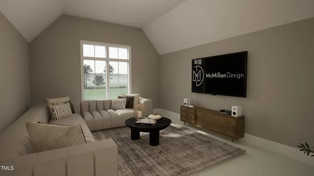 a living room with furniture a rug and a flat screen tv