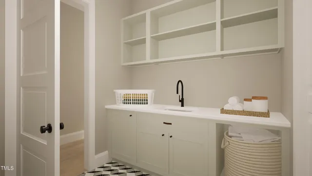 a view of a hallway with wooden floor and entryway