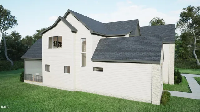 a view of white house with a yard